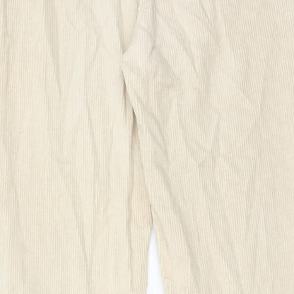 Brand and care label for Denim & Co. women’s beige cotton trousers, size UK 10, regular zip