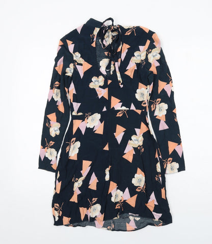 Back view of ASOS women’s black geometric viscose a-line, size UK 4, round neck zip