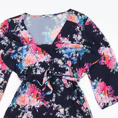 Close-up detail of Only women’s blue floral polyester a-line, size UK 14, v-neck pullover