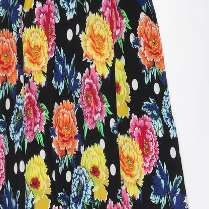 Brand and care label for ASOS women’s multicoloured floral polyester maxi, size UK 12, round neck pullover