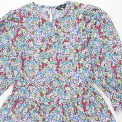 Close-up detail of Miss Selfridge women’s multicoloured floral polyester a-line, size UK 14, round neck button