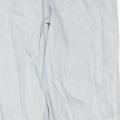 Close-up detail of Missguided women’s blue cotton tapered jeans, size UK 8, regular zip