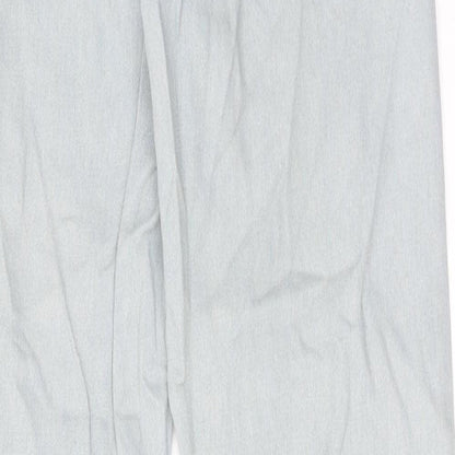 Brand and care label for Missguided women’s blue cotton tapered jeans, size UK 8, regular zip