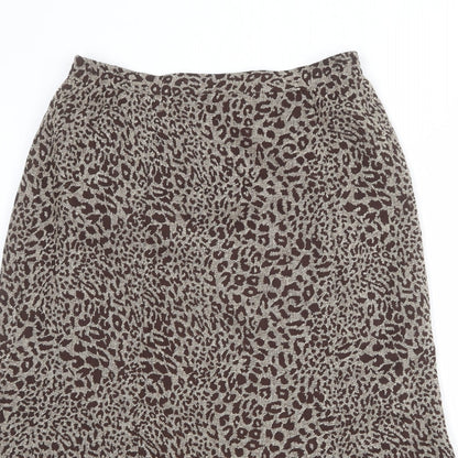 Close-up detail of Oscar B women’s brown animal print polyester a-line skirt, size UK 14, zip - leopard pattern