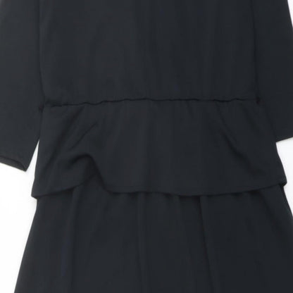 Brand and care label for C&A women’s black polyester a-line, size UK 12, cowl neck pullover