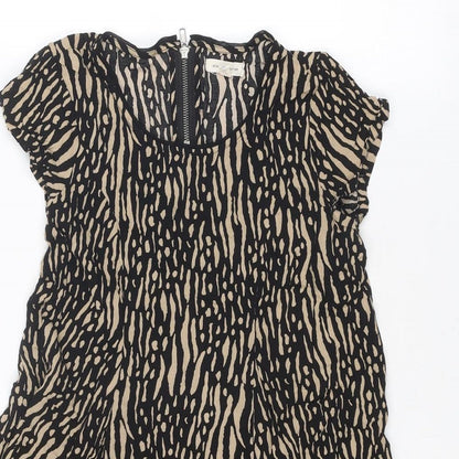 Close-up detail of Silent + Noise women’s black geometric viscose basic blouse, size XS, round neck - asymmetric hem