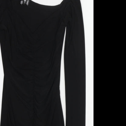 Close-up detail of Missguided women’s black polyester shift, size UK 8, one shoulder pullover - asymmetric neckline
