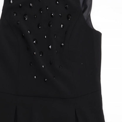 Close-up detail of Autograph women’s black polyester shift, size UK 14, boat neck zip