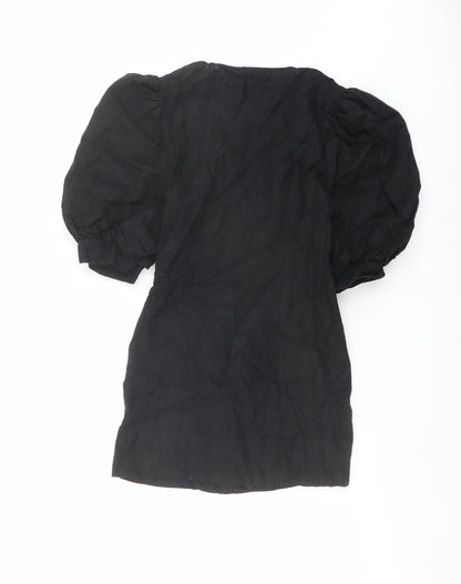 Back view of ASOS women’s black polyester jacket dress, size UK 6, v-neck button