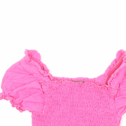Close-up detail of Studio girls’ pink 100% cotton cropped blouse, size 8-9, years square neck pullover