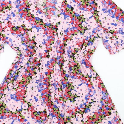 Brand and care label for Miss Selfridge women’s multicoloured floral polyester mini, size UK 8, round neck pullover