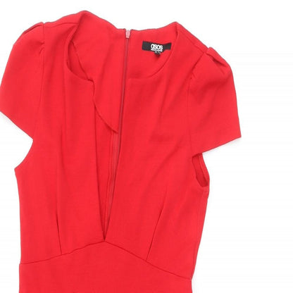 Close-up detail of ASOS women’s red acrylic shift, size UK 10, v-neck zip