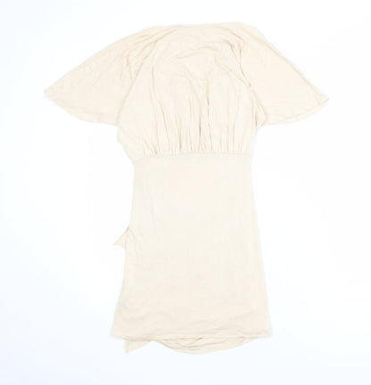 Back view of ASOS women’s beige viscose mini, size UK 8, cowl neck pullover