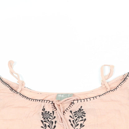 Close-up detail of ASOS women’s pink cotton basic blouse, size UK 8, off the shoulder