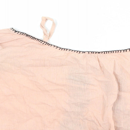 Brand and care label for ASOS women’s pink cotton basic blouse, size UK 8, off the shoulder