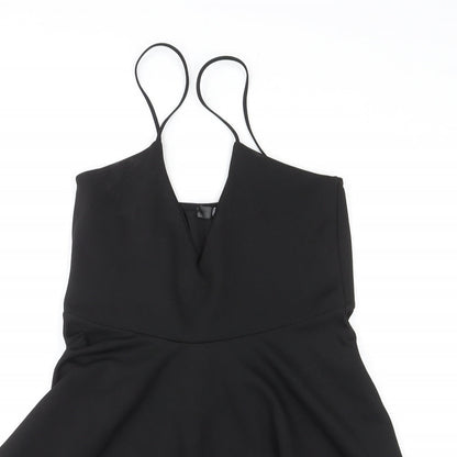 Close-up detail of Missguided women’s black polyester mini, size UK 14, v-neck pullover