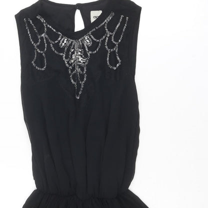 Close-up detail of ASOS women’s black polyester fit & flare, size UK 8, roll neck button