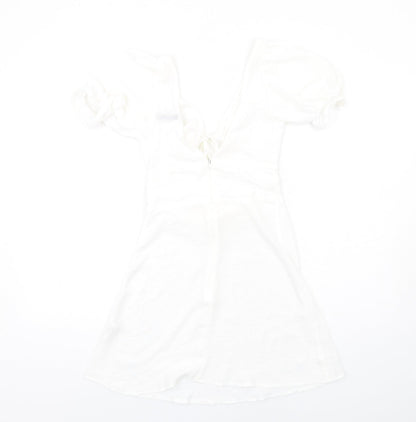 Back view of ASOS women’s white polyester a-line, size UK 8, v-neck zip