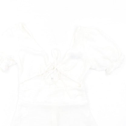 Close-up detail of ASOS women’s white polyester a-line, size UK 8, v-neck zip