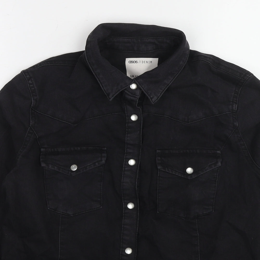 Close-up detail of ASOS women’s black jacket, size UK 12, snap