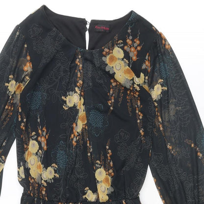 Close-up detail of Miss Selfridge women’s black geometric polyester a-line, size UK 6, round neck button