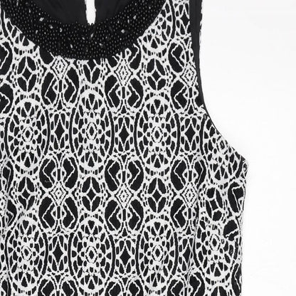 Close-up detail of Roman women’s black geometric polyimide shift, size UK 12, boat neck pullover
