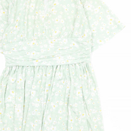Brand and care label for ASOS women’s green floral polyester mini, size UK 14, round neck button