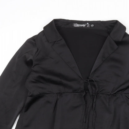 Close-up detail of Missguided women’s black polyester basic blouse, size UK 8, collared