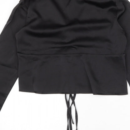 Brand and care label for Missguided women’s black polyester basic blouse, size UK 8, collared