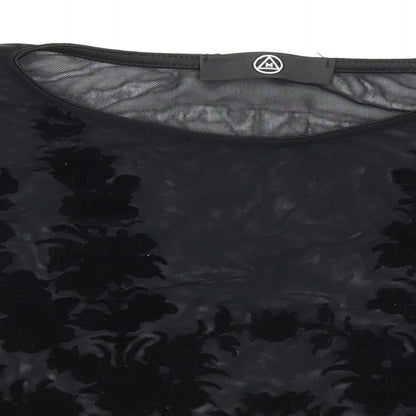Close-up detail of Missguided women’s black polyester cropped blouse, size UK 8, round neck