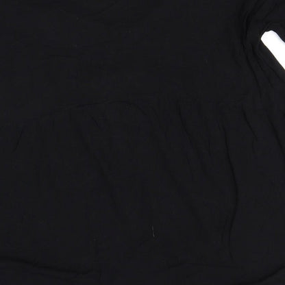 Brand and care label for Missguided women’s black polyester basic button-up, size UK 14, scoop neck