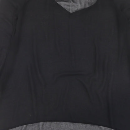 Brand and care label for Miss Selfridge women’s black polyester basic blouse, size UK 6, v-neck