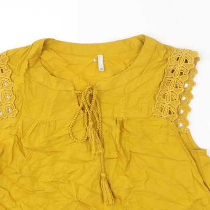 Close-up detail of Only women’s yellow viscose basic tank, size UK 10, round neck