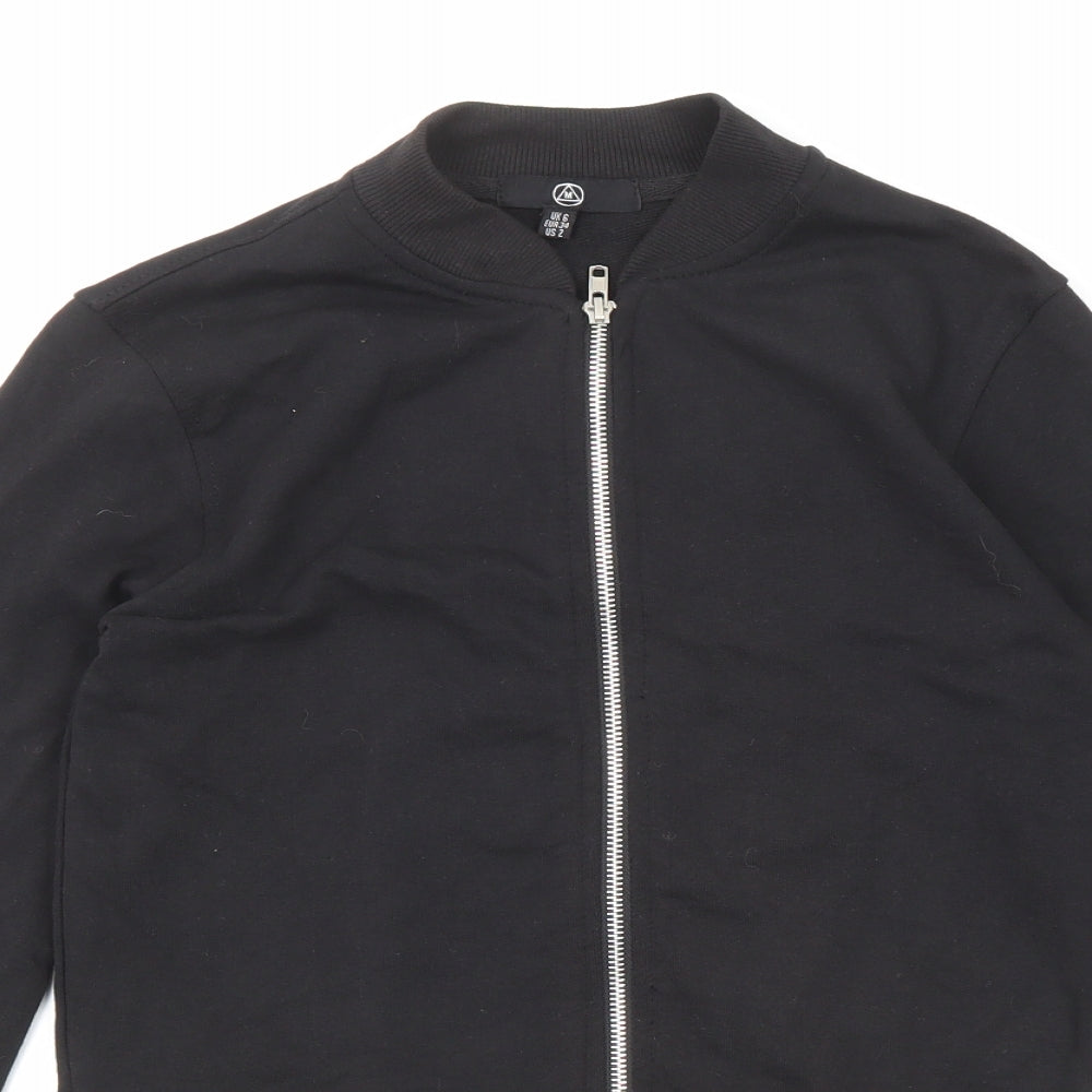 Close-up detail of Missguided women’s black jacket, size UK 6, zip