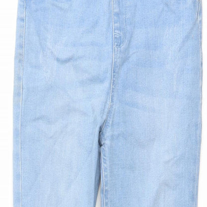 Close-up detail of Denim & Co. girls’ blue cotton jegging jeans, size 10-11, years regular pullover - raw hem