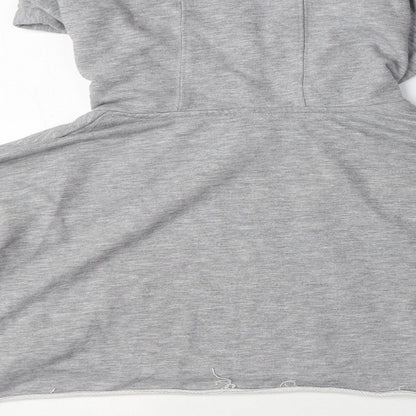 Brand and care label for IVY PARK women’s grey polyester pullover hoodie, size S, pullover