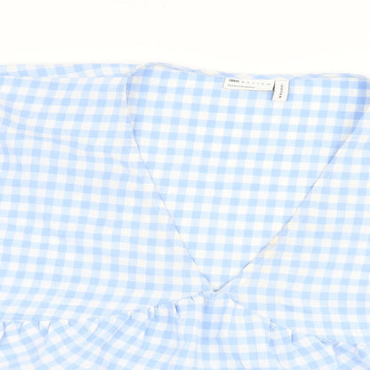 Close-up detail of ASOS women’s blue check polyester basic blouse, size UK 10, v-neck