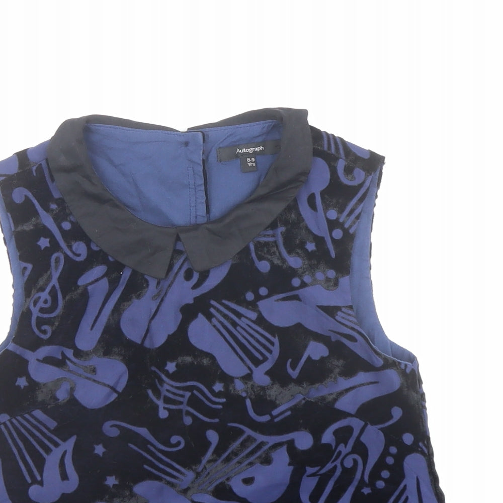 Close-up detail of Autograph girls’ blue geometric viscose basic blouse, size 8-9, years collared button