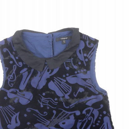 Close-up detail of Autograph girls’ blue geometric viscose basic blouse, size 8-9, years collared button