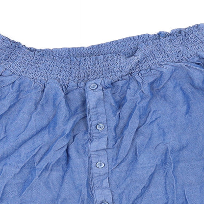 Close-up detail of Miss Selfridge women’s blue viscose basic button-up, size UK 8, off the shoulder - tie sleeves