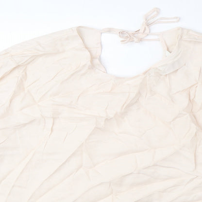 Close-up detail of Autograph women’s pink cupro basic blouse, size UK 20, round neck
