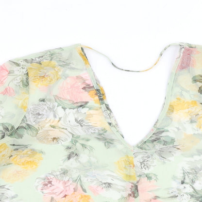 Close-up detail of Miss Selfridge women’s green floral polyester basic blouse, size UK 12, v-neck