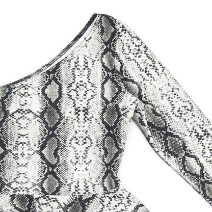 Close-up detail of ASOS women’s black animal print polyester basic t-shirt, size UK 10, one shoulder - snakeskin print