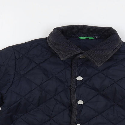Close-up detail of United Colors of Benetton boys’ blue quilted jacket, size 4, years snap