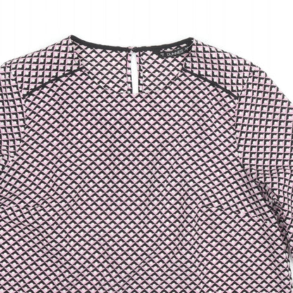 Close-up detail of Dunnes women’s pink geometric polyester basic blouse, size S, round neck