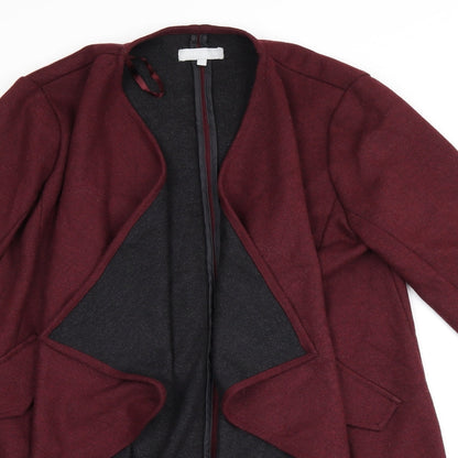 Close-up detail of Red Herring women’s red overcoat coat, size UK 12, - waterfall front