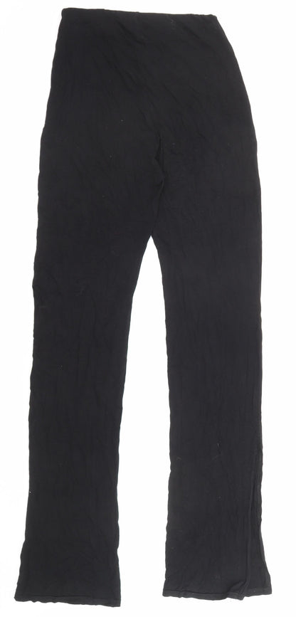 Back view of Missguided women’s black viscose trousers, size UK 10, 32-inch leg regular