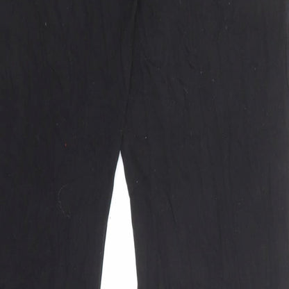 Brand and care label for Missguided women’s black viscose trousers, size UK 10, 32-inch leg regular