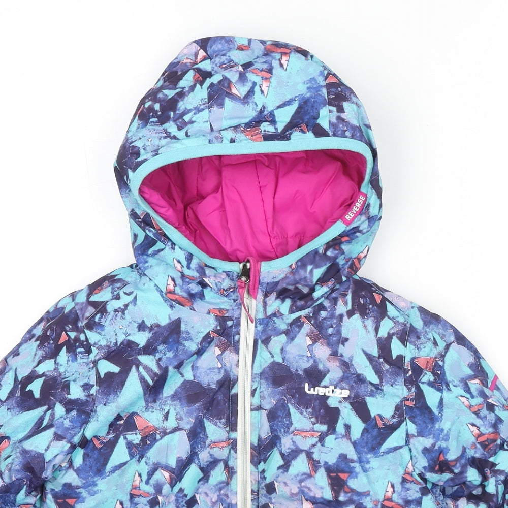 Close-up detail of Decathlon girls’ multicoloured geometric puffer jacket jacket, size 5, years zip - reversible