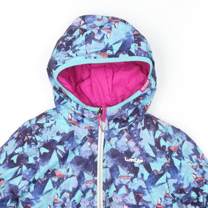 Close-up detail of Decathlon girls’ multicoloured geometric puffer jacket jacket, size 5, years zip - reversible